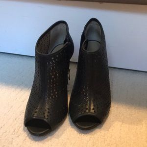 Stylish perforated bootie heels